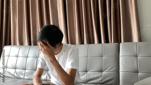 Asian man have feeling stressed, depressed, anxiety, or missing someone