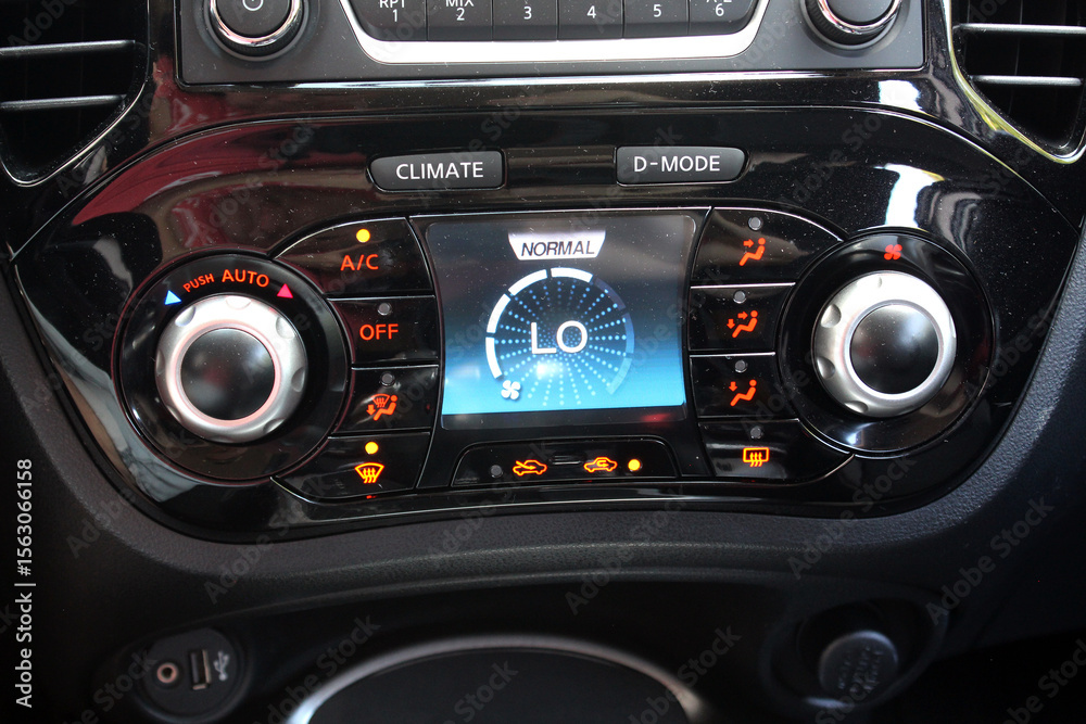 Fototapeta premium Car air conditioning on maximum cold setting. Car air conditioning. The air flow inside the car. Detail interior of vehicle. Air conditioning of a modern car. Vehicle Conditioner Power Regulator