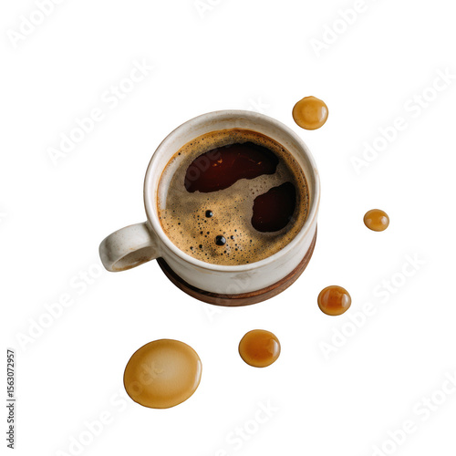 A cup of dark coffee with spills isolated on transparent background