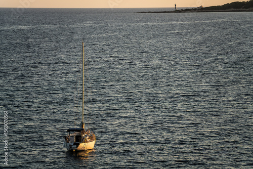boat anchored near the point of S'estalella, Llucmajor, Mallorca, Balearic Islands, Spain