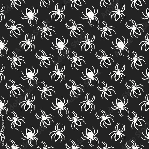 A seamless pattern featuring white spider silhouettes against a dark gray or black background. The spiders are arranged in diagonal rows, creating a repeating design.