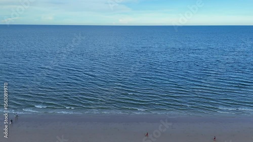 Aerial view of Thai beachfront city with hotels and beach