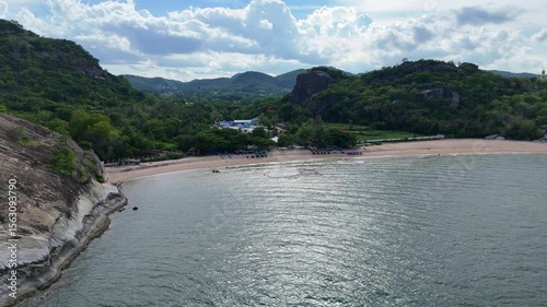 Remote bay surrounded by tropical forest and hills