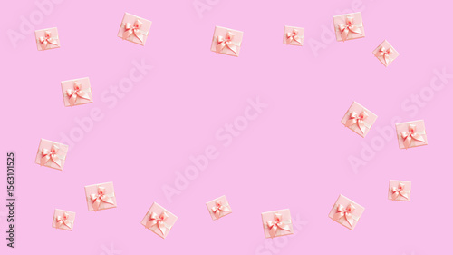 Delicate Frame of Pink Gift Boxes on a Pastel Pink Background
