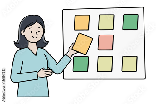 A woman in a light blue shirt places a yellow sticky note onto a whiteboard with colorful squares representing tasks or ideas