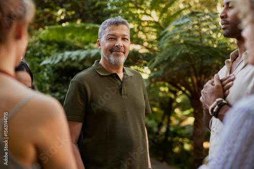 Portrait of middle aged man at meditation retreat