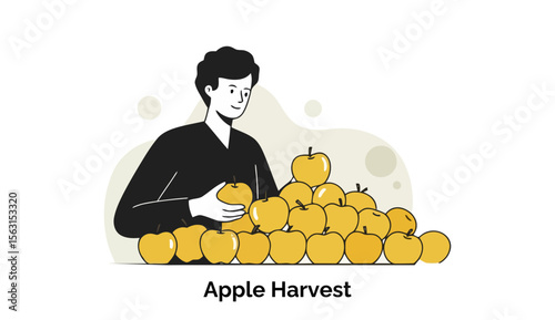 Young adult male farmer inspecting a pile of golden apples during the harvest season in an orchard. Worker in black clothing meticulously examining the fruit at a farm location.