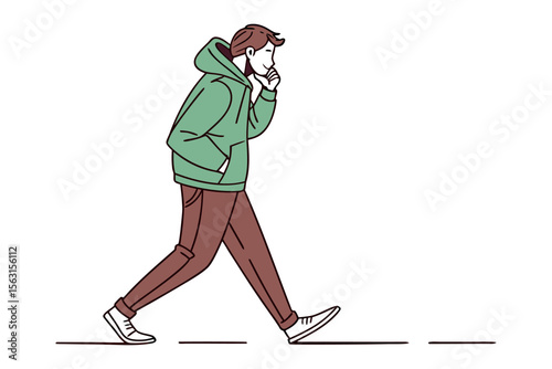 A young man in a green hoodie and brown pants walks thoughtfully touching his chin with his hand on a white background
