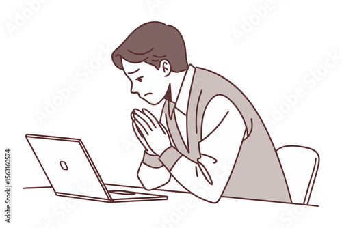 A worried man with clasped hands looking down at his laptop screen appearing stressed or pleading for help