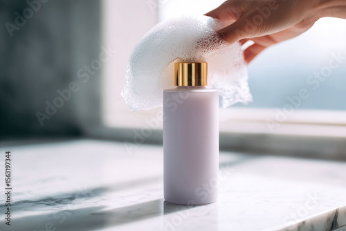 Wallpaper Mural Elegant bottle with foam, evoking relaxation and selfcare. Perfect for beauty, bath, spa, wellness promotions. Soft light, clean aesthetic, marble surface. Torontodigital.ca