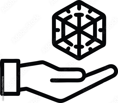 Human hand gently guiding a geometric cube silhouette design with transparency