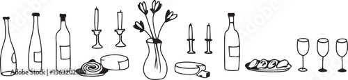Bottles candles flowers cheese wine glasses candlesticks