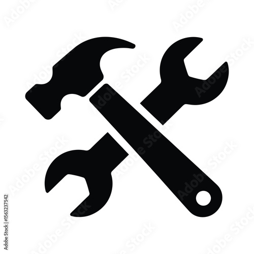 Black silhouette of a hammer and wrench crossed isolated on white background