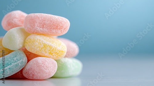 Playful colorful jelly beans with pastel tones background