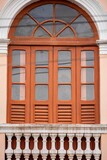 Vintage Arched Window with Balcony Railing