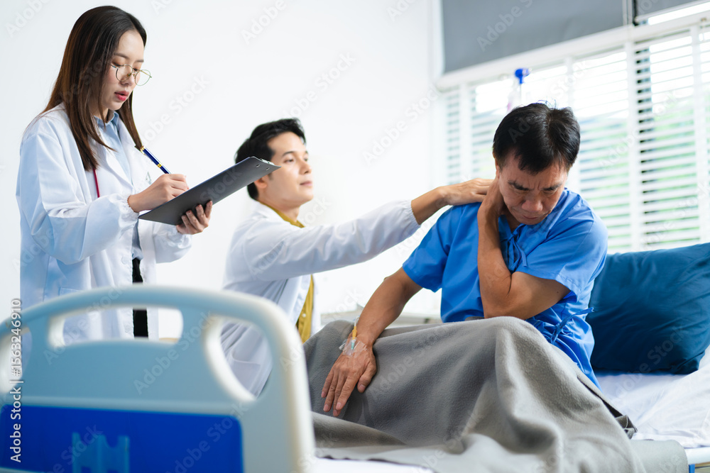 Obraz premium Doctor and nurse assess senior patient’s leg injury in hospital, using tablet x-ray to explain diagnosis and care.