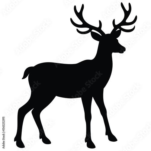 Majestic black silhouette of a reindeer with large antlers animal