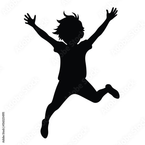 Silhouette of a child jumping with arms raised freedom