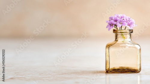 Minimalist wildflower arrangement in a vintage glass bottle on neutral background, soft pastel tones, perfect for wellness or editorial, with space for text.