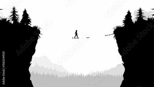 Silhouette of a person walking across a narrow path between cliffs with trees and a mountain range view