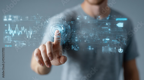 Man touching virtual interface with futuristic digital graphics
