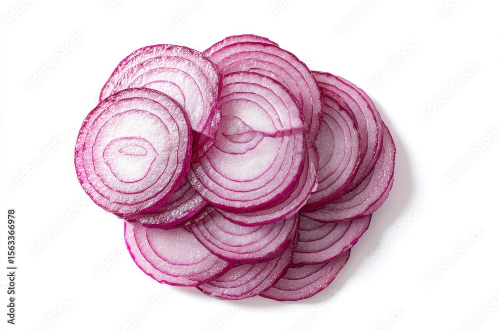 Fototapeta premium Sliced red onions stacked rings visible creating an overlapping pattern white background