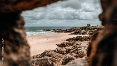 Beach view through rocks
