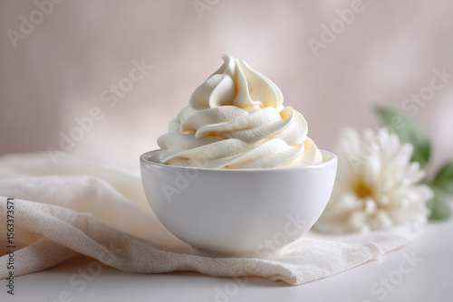 Creamy swirl of soft serve, a simple dessert in a white bowl with a delicate flower background. Fresh and delicious indulgence.