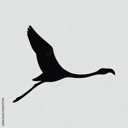Silhouette flamingo flying beautifully in the air vector illustration