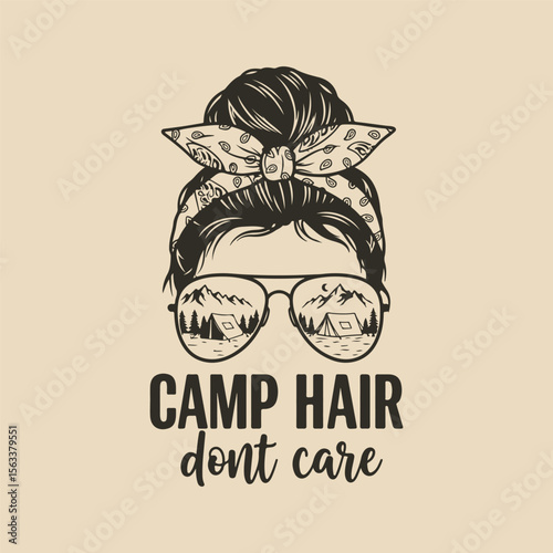 "Camp Hair Don't Care" funny slogan. Woman with messy bun and sunglasses with mountain reflection. T-shirt design for camping adventure.