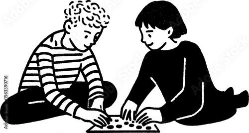 Childhood fun: siblings engaged in board game playtime