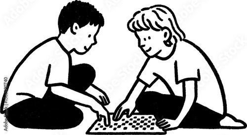 Siblings enjoying board games on the floor - family fun and bonding