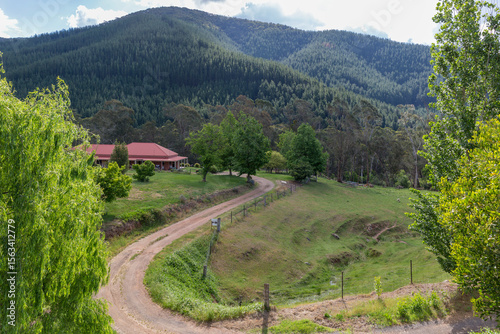 Winding drive to high country home among hills