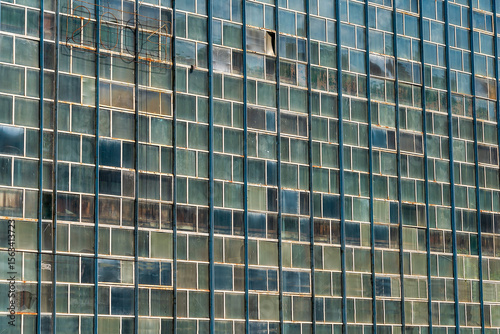 Large Industrial Building with Weathered Glass Panels