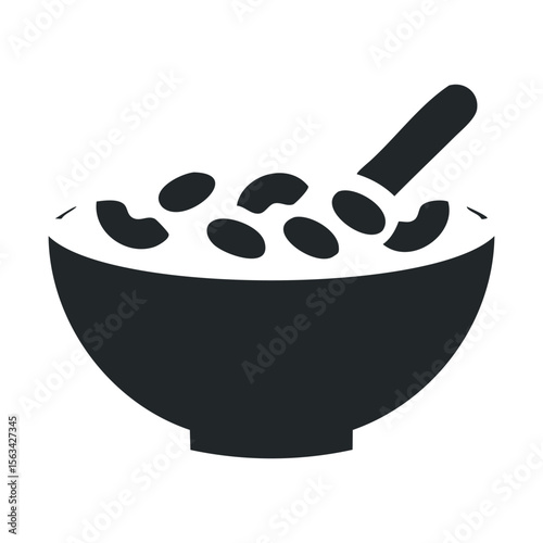 Monochrome icon of breakfast cereal bowl with spoon and floating pieces