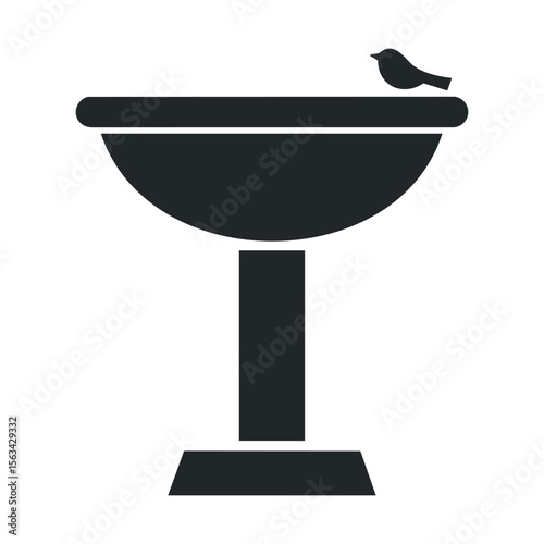 Silhouette of bird on pedestal birdbath: minimalist design