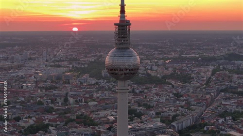 Alexanderplatz TV Tower Close Up View, Fernsehturm at Sunset Time in Berlin City Center, Aerial Parallax Drone Shot.