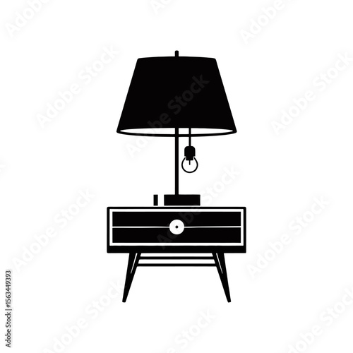 Black and white table with lamp in a modern interior setting