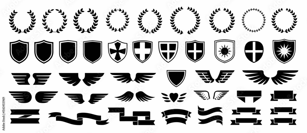 Fototapeta premium Heraldic elements: wreaths, shields, wings, and ribbons for logo or badge design
