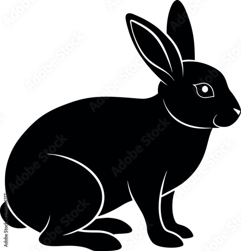 A Black Rabbit Sits Facing Right in a Simple Silhouette