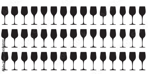 Elegant Arrangement of Wine Glasses Displaying Symmetry and Repetition Creating a Visually Appealing and Sophisticated Beverage Theme