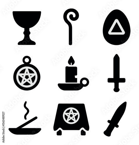 Ritual Tools Icons. Solid, filled icons set of ritual tools and symbols: chalice, staff, sacred stone, amulet,
