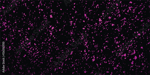 Abstract pink splatter pattern on black background ideal for creating modern art designs and diverse graphic design elements