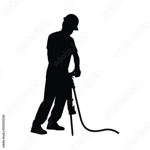 Silhouette of Worker Using Jackhammer for Construction or Industrial Work