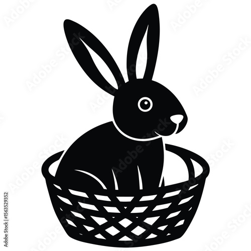 Cute black silhouette of a bunny rabbit sitting inside a woven basket