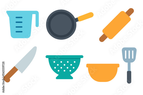 Kitchen tools and utensils arranged neatly on a clean surface for cooking preparation