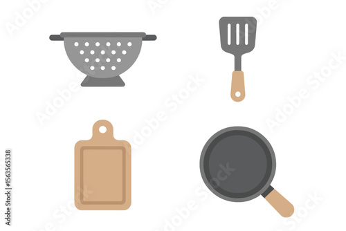 Kitchen utensils arranged for cooking and food preparation on a clean workspace in a modern kitchen