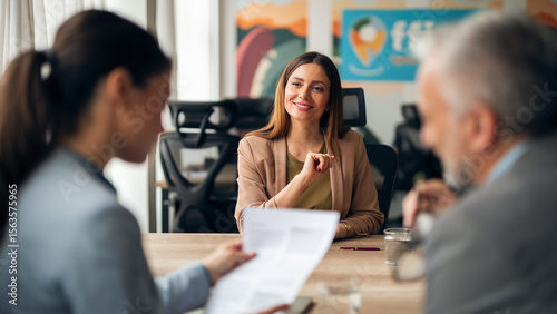 Professional Business Interview in a Collaborative Office Setting