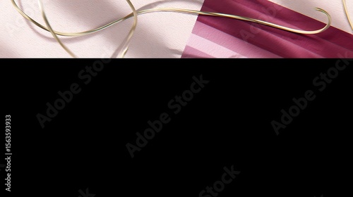 Abstract design with gold thread on a pink and burgundy background