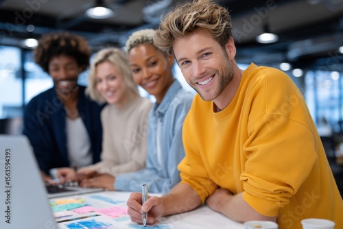 Group of Diverse Young Adults Working Collaboratively at a Modern Office Space du a Creative Team Meeting or Brainstorming Session